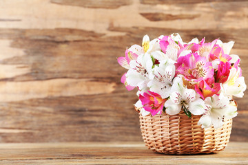 Bouquet of alstroemeria on wooden background