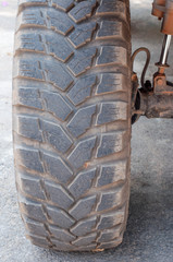 Dirty car's wheels in off-road