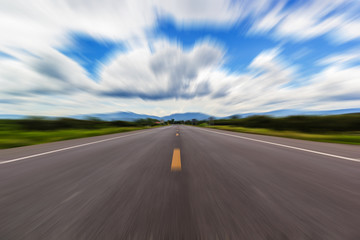 Obraz na płótnie Canvas Motion blur of a rural road to infinity