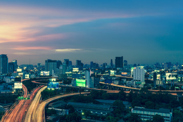 Fototapeta na wymiar Business Building Bangkok city area at night life with transport