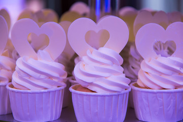  variety of cupcakes from a dessert buffet at a wedding