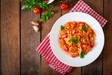 Fettuccine pasta with shrimp, tomatoes and herbs
