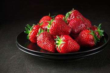 Strawberries in black plate