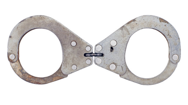Iron handcuffs. Isolated on white