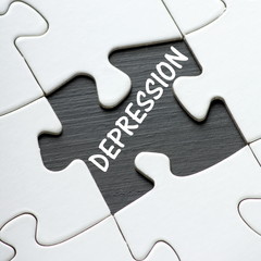 The word Depression under a missing jigsaw puzzle piece