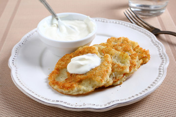 Frying pancakes with sour cream