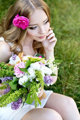 Fototapeta premium Beautiful bride in the garden. Soft focus. 