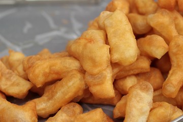Deep-fried dough stick in market