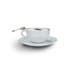 Cappuccino coffee in white cup with Dragonfly