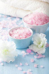 Obraz na płótnie Canvas spa aromatherapy set with azalea flowers and herbal salt