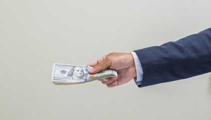 Businessman hand with money, United stage dollar bill