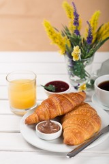 Breakfast, croissants, jam.