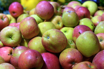 apples on display in a supermarket