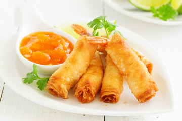 Spring rolls with shrimp with sweet chili sauce. Asian cuisine.