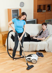 Girl cleaning with vaccuumcleaner
