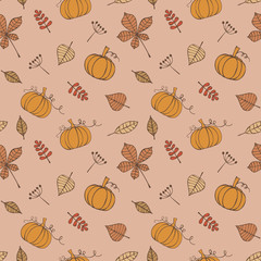 Seamless pattern with pumpkins and leaves