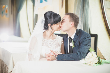 gentle bride and groom