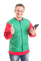 Friendly supermarket employee using wireless tablet