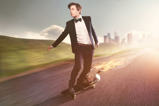 Businessman on a motorized Skateboard