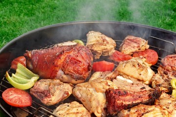 Meat And Vegetables Mix On The Hot BBQ Grill