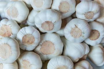 several garlic lumps lying at market for sale