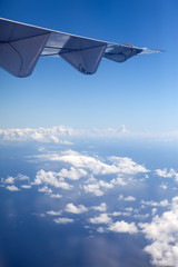 Fototapeta na wymiar Polynesia. The ocean through clouds. Aerial view.