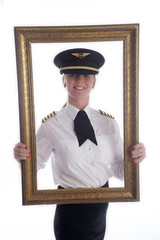 Frame and portrait of a female airline pilot