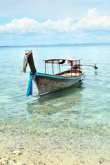 Wooden boats on summer sea