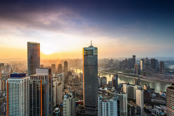 High angle view of modern skyline during sunset