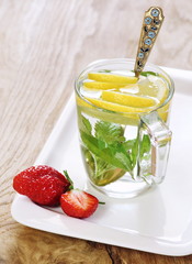 Refreshing drink with lemon and mint