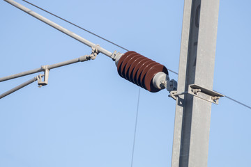 Obraz premium Detail view of the electrical wires of a train station.