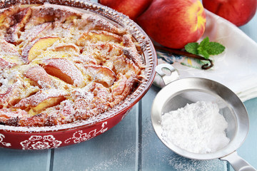 Peach Clafouti with Powered Sugar