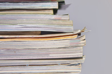 pile of old magazines and books close up