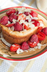 Curd pudding with berries honey and almonds
