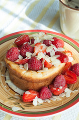 Curd pudding with berries honey and almonds