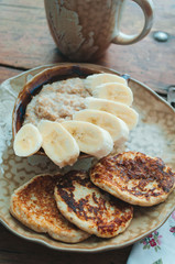 Cottage cheese pancakes and porridge