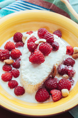 Cottage cheese with berry, nuts and maple syrup