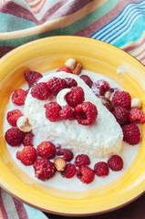 Cottage cheese with berry, nuts and maple syrup
