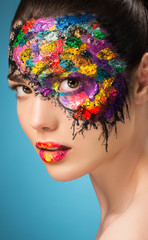 Beautiful fashion woman color face art.