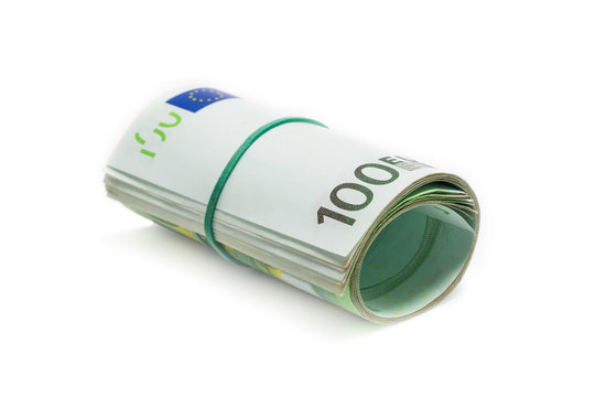 roll of 100 euro banknotes on white background