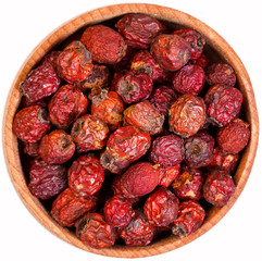 Crataegus Aestivalis berries in a small  wooden bow isolated on
