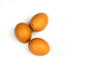 Three eggs on white background