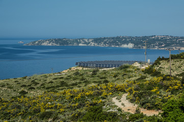 Fototapeta na wymiar Solar farm on a hill on the island of Kefalonia.
