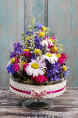 Fototapeta na wymiar Table floral arrangement with gerbera flowers
