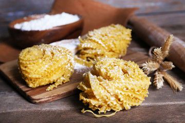 Still life of preparing pasta on rustic wooden background