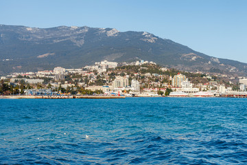 Fototapeta na wymiar Beautiful view on embankment of Yalta. Sunny day. 