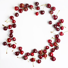 Red cherries on a white background