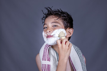Having fun with shaving cream.