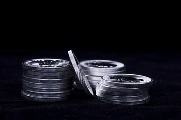 Stacked up silver coins.