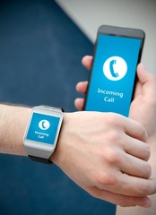 Incoming call notification on smart watch connected to smart pho